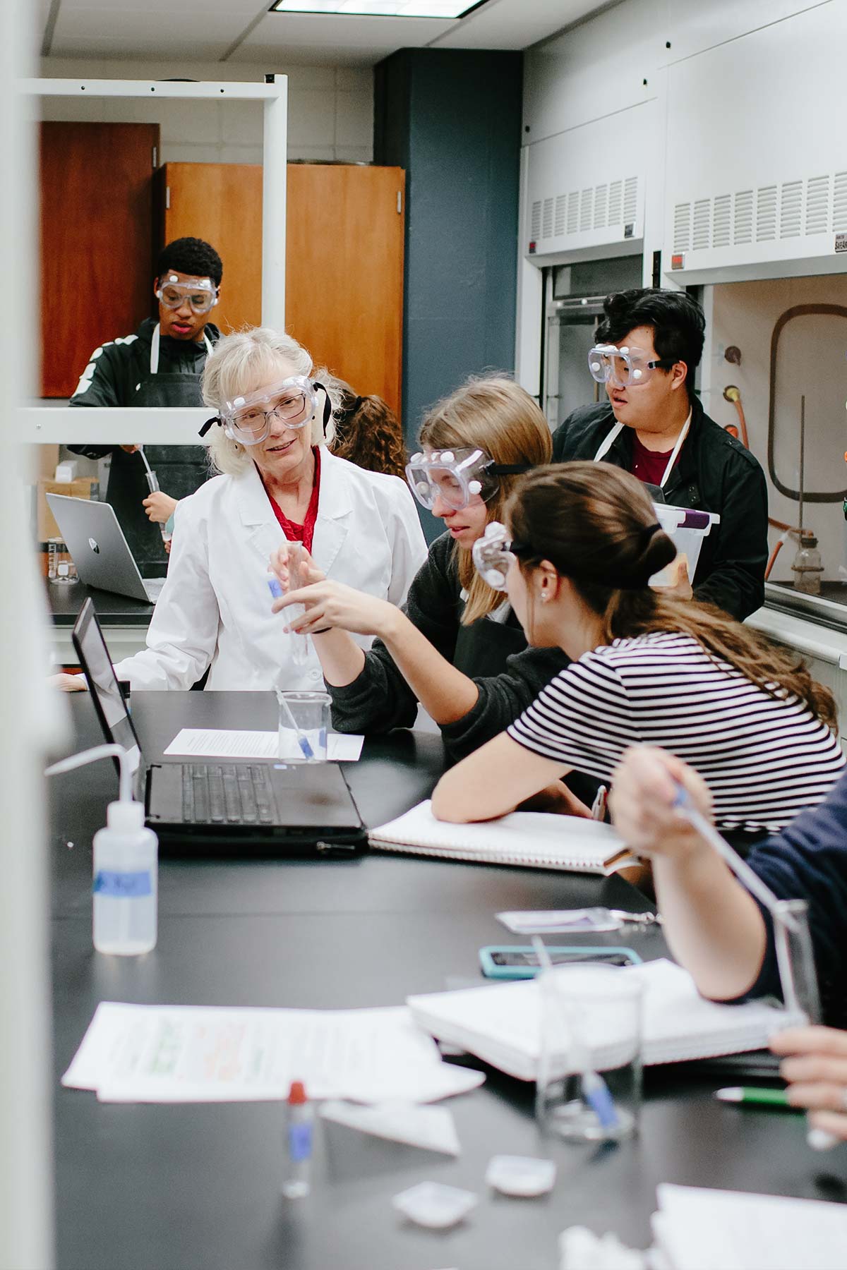student in science class as christian biologist