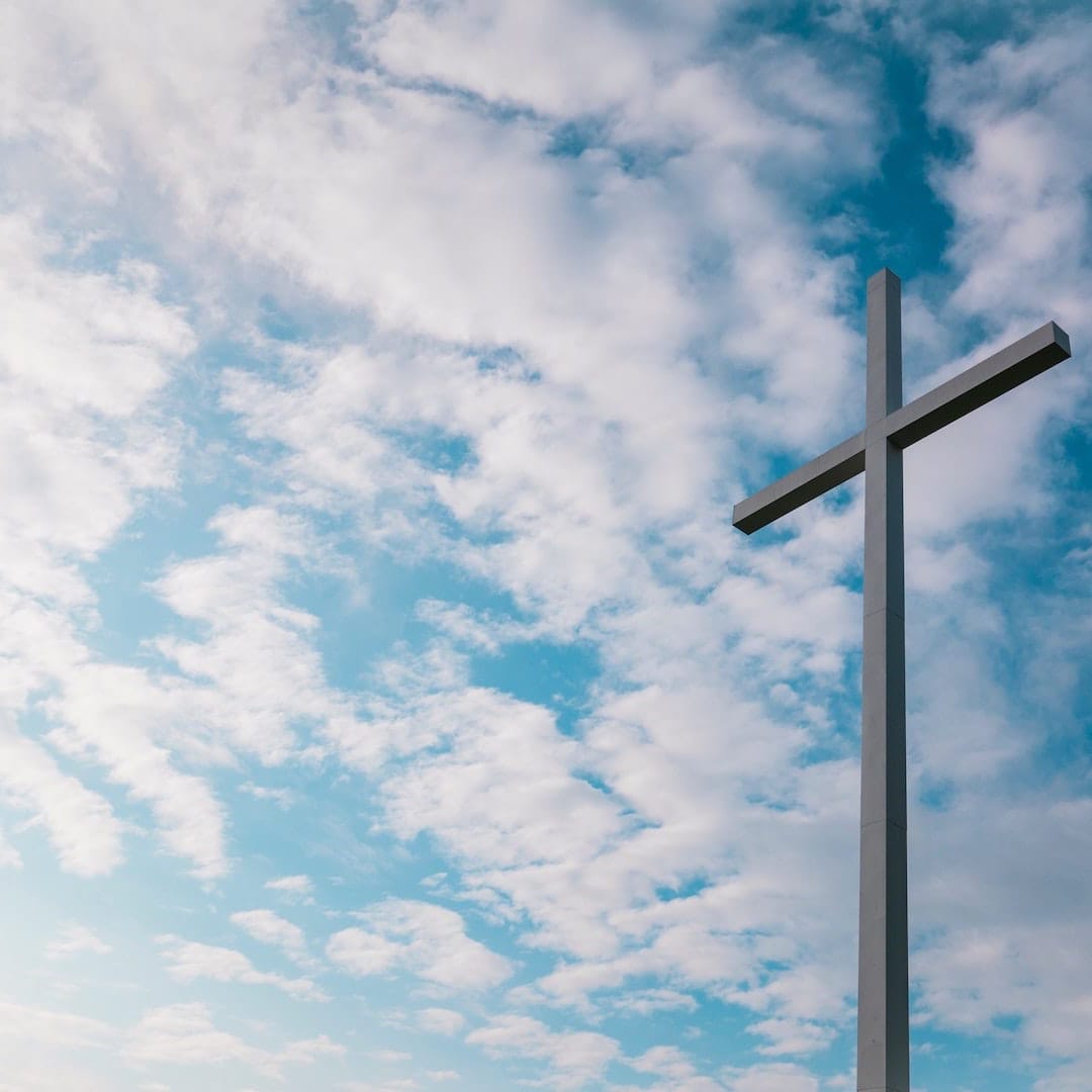 Cross_up_again_blue_cloudy_sky_flipped