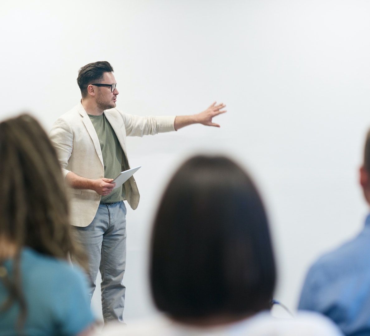 man in beige blazer alumni teaching christian college degrees